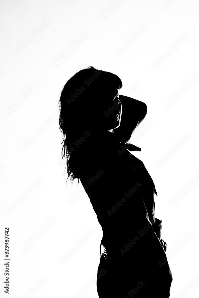 Silhouette of a beautiful happy girl on a white background.