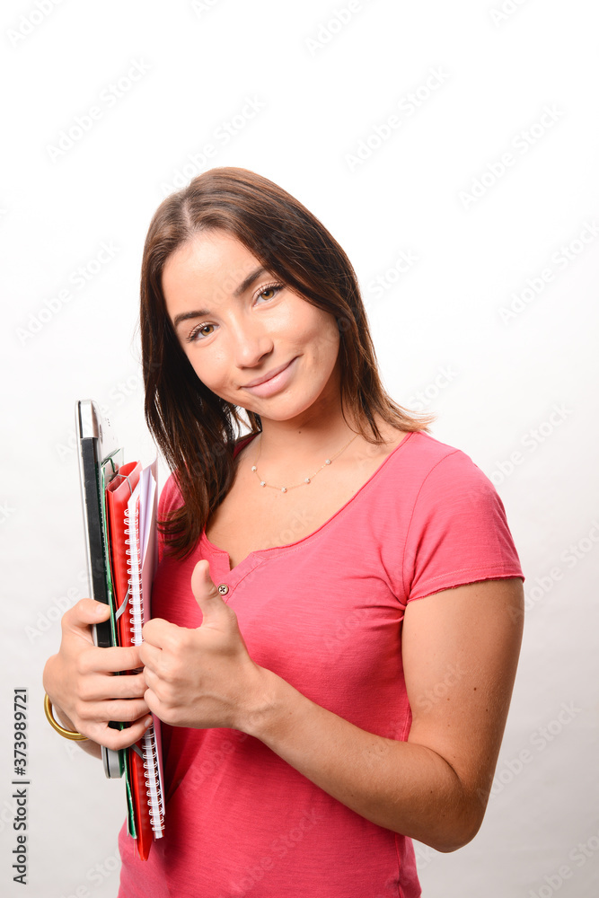 portrait of beautiful young girl student isolated on white background