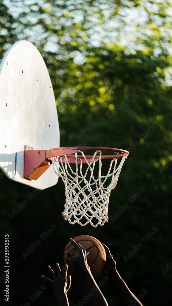 basketball hoop and ball in the park