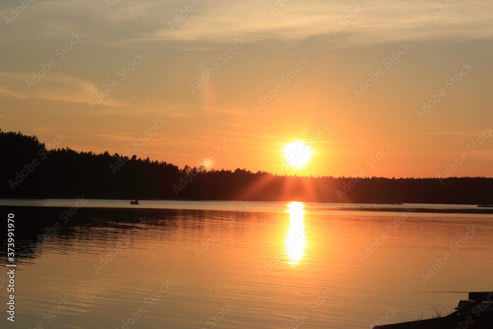 Obraz premium sunset over lake