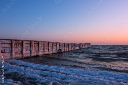 frozen pier at the Baltic Sea, winter seascape © Lars Gieger
