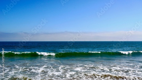 sea, beach, ocean, water, sky, blue, coast, waves, sand, landscape, nature, wave, summer, clouds, travel, horizon, tropical, seascape, cloud, beauty, surf, panorama, shore, vacation, bay