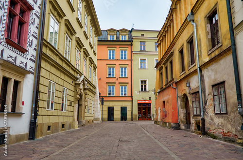 Fototapeta Naklejka Na Ścianę i Meble -  Poland. Krakow. Houses and street of the city of Krakow. Cityscape. February 21, 2018