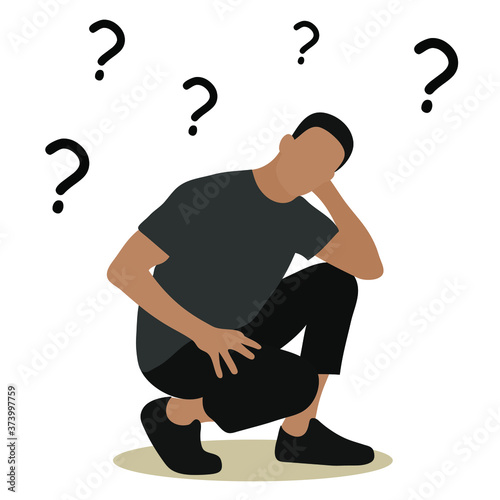Man squats and thinks about something