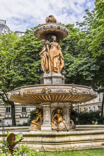 Fontaine Louvois - monumental public fountain in Square Louvois on Richelieu Street in Paris. Fontaine Louvois built between 1836 and 1839 during the reign of King Louis-Philippe. Paris, France.
