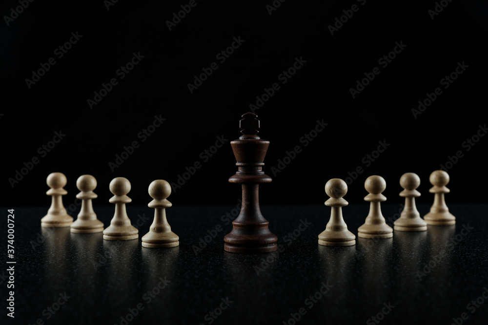 chess pieces on black background chess pieces on black background