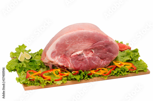 raw pork meat on cutting board on white background
