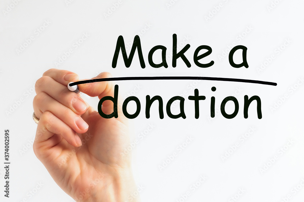 Hand writing inscription Make A Donation with marker, concept Hand writing inscription Make A Donation with marker, concept