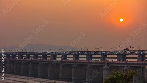 Historic Prakasam barrage in twilight, at Vijayawada, India © SNEHIT PHOTO
