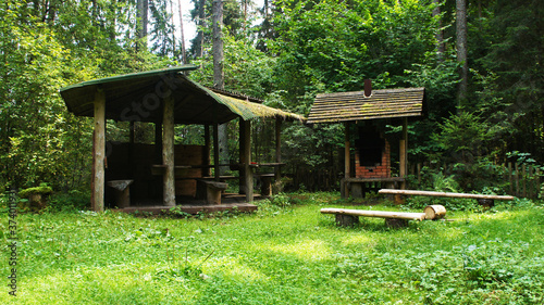 Old abandoned gazebo with a stove in the park