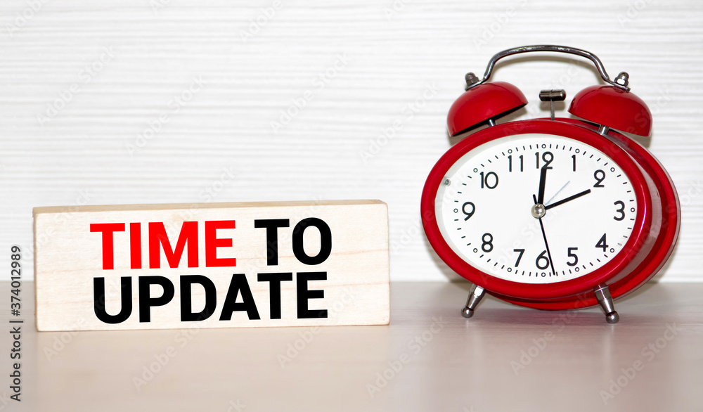 Alarm clock and text Time to Update. Time to Update concept. Alarm clock and text Time to Update. Time to Update concept.