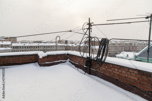 Rooftop of industrial building covered with snow in Saint Petersburg