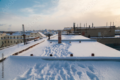 Footprints on snowy rooftop