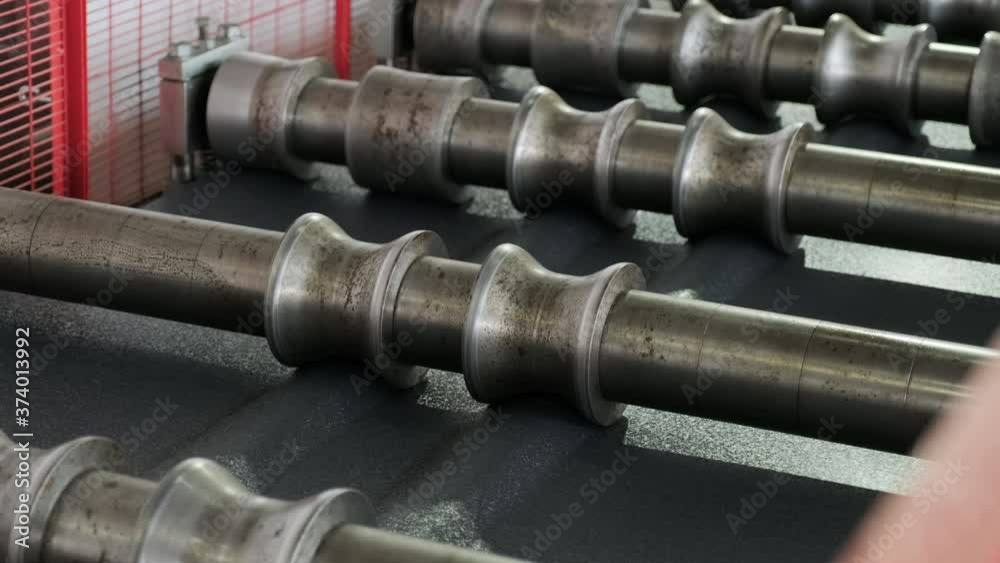 Metal sheet forming machine at the modern metalwork factory. Metal sheet forming machine at the modern metalwork factory.