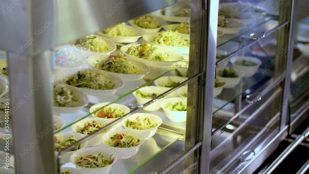 cooking. closeup. Cuisine cafeteria buffet with food, many bowls of