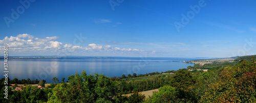 Fototapeta Naklejka Na Ścianę i Meble -  Panoramic View To Lake Vattern On A Sunny Summer Day With A Clear Blue Sky