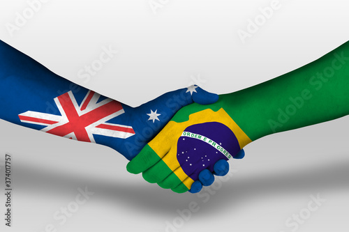 Canvas Print Handshake between brazil and australia flags painted on hands, illustration with clipping path