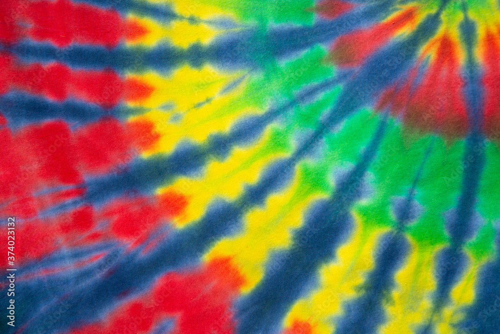 reggae abstract spiral tie dye. red yellow green tricolor pattern.