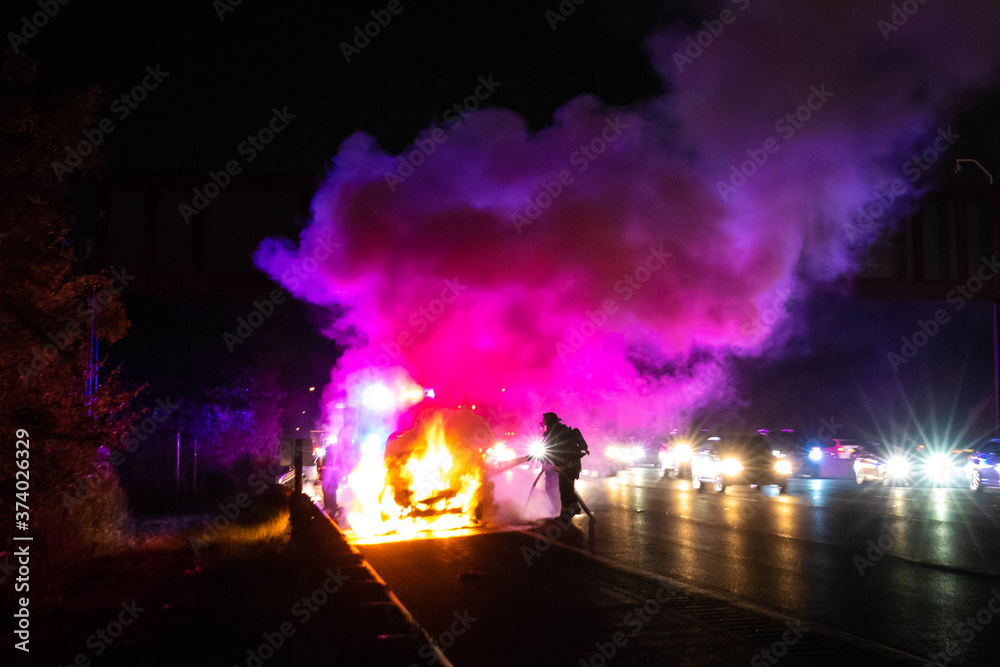 Car on fire night accident on the highway road Car on fire night accident on the highway road
