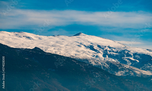 Panoramic view of Granada City with Sierra Nevada in Background