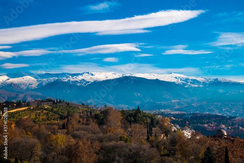 Panoramic view of Granada City with Sierra Nevada in Background