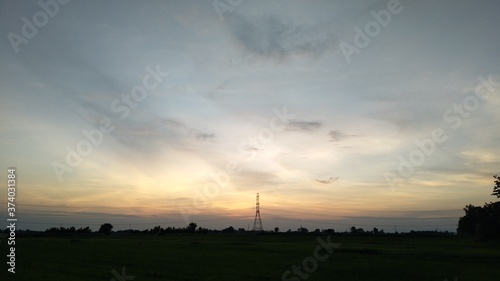 sunset in the field © Apichai