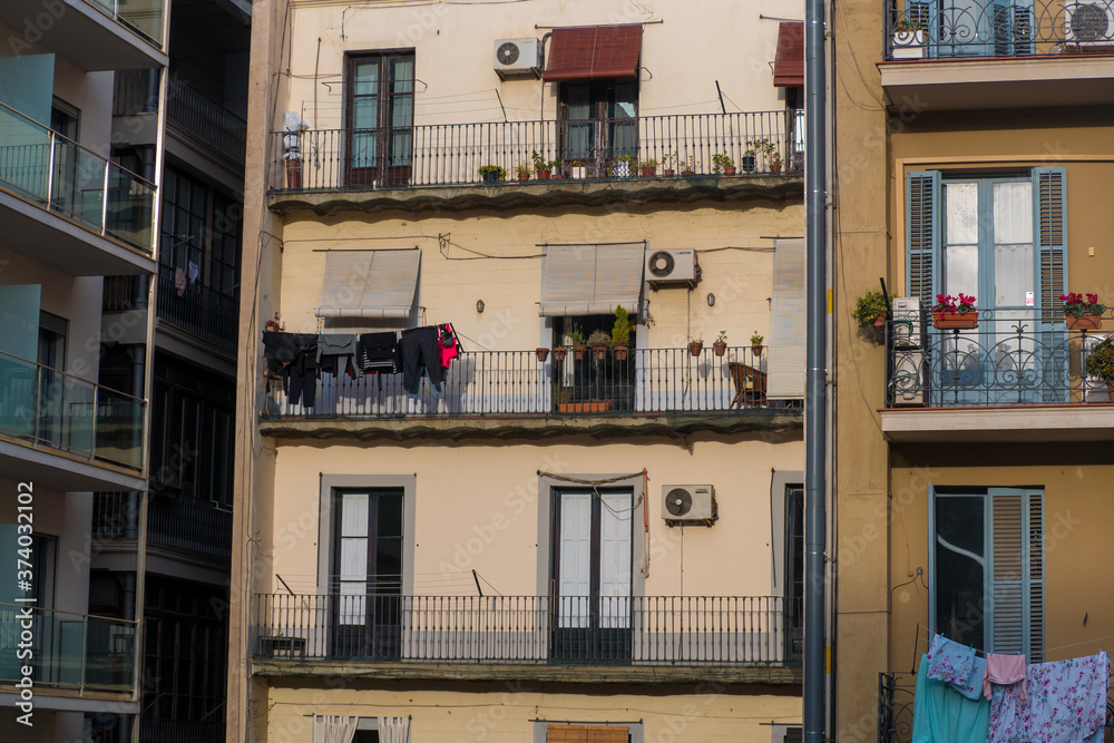 clothes drying in a apartment facade