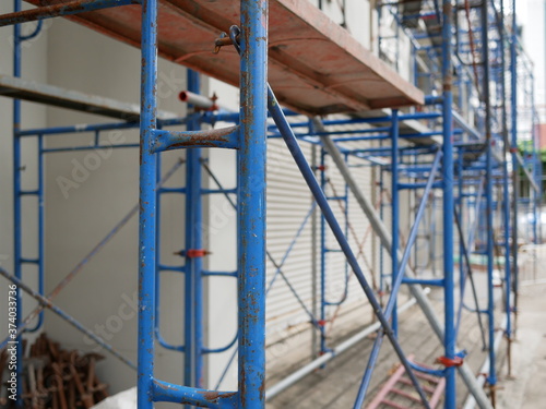 steel scaffolding at construction site with protection.