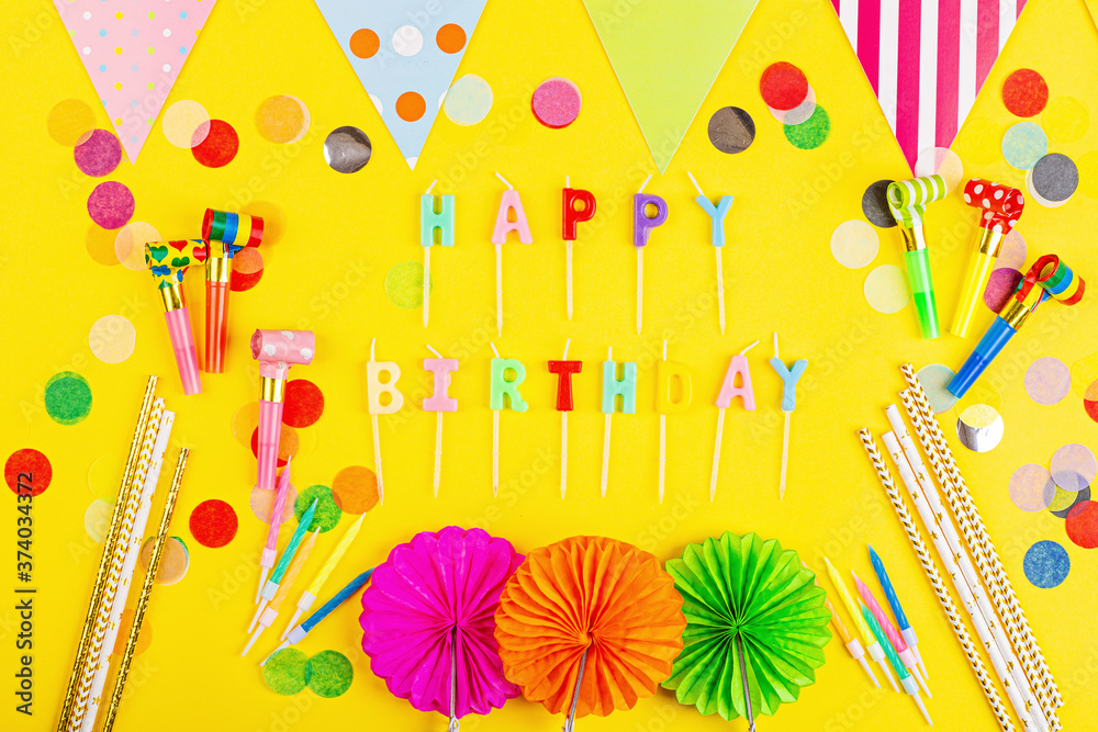 Birthday decor on yellow background, top view. Flat lay style. Mockup, template Birthday decor on yellow background, top view. Flat lay style. Mockup, template