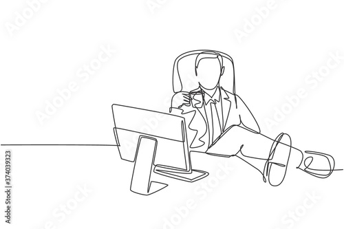 Single continuous line drawing of young happy business man analyzing annual report at computer screen while take a break at office. Drinking coffee concept one line draw design vector illustration