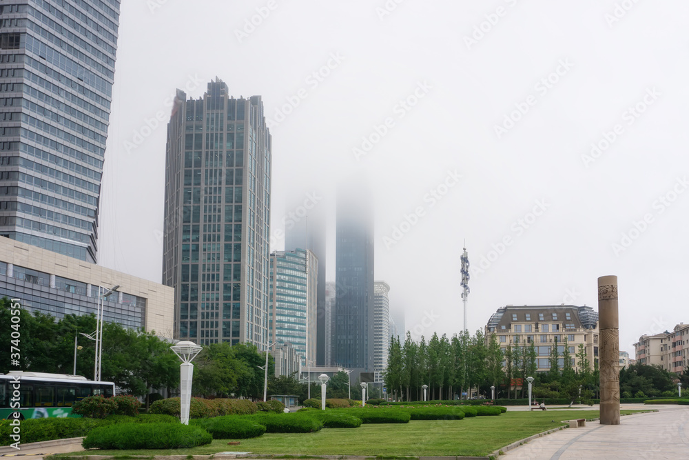 Urban architecture landscape in the fog in Qingdao, China