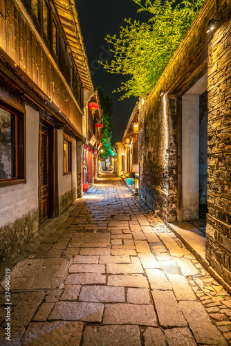 Fototapeta Naklejka Na Ścianę i Meble -  At night, the streets of Zhouzhuang Ancient Town, Suzhou, China