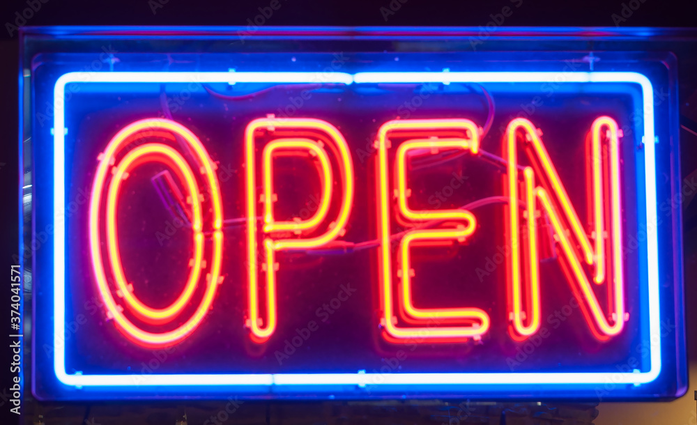 Open sign, illuminated in bluie and red neon lighting Open sign, illuminated in bluie and red neon lighting