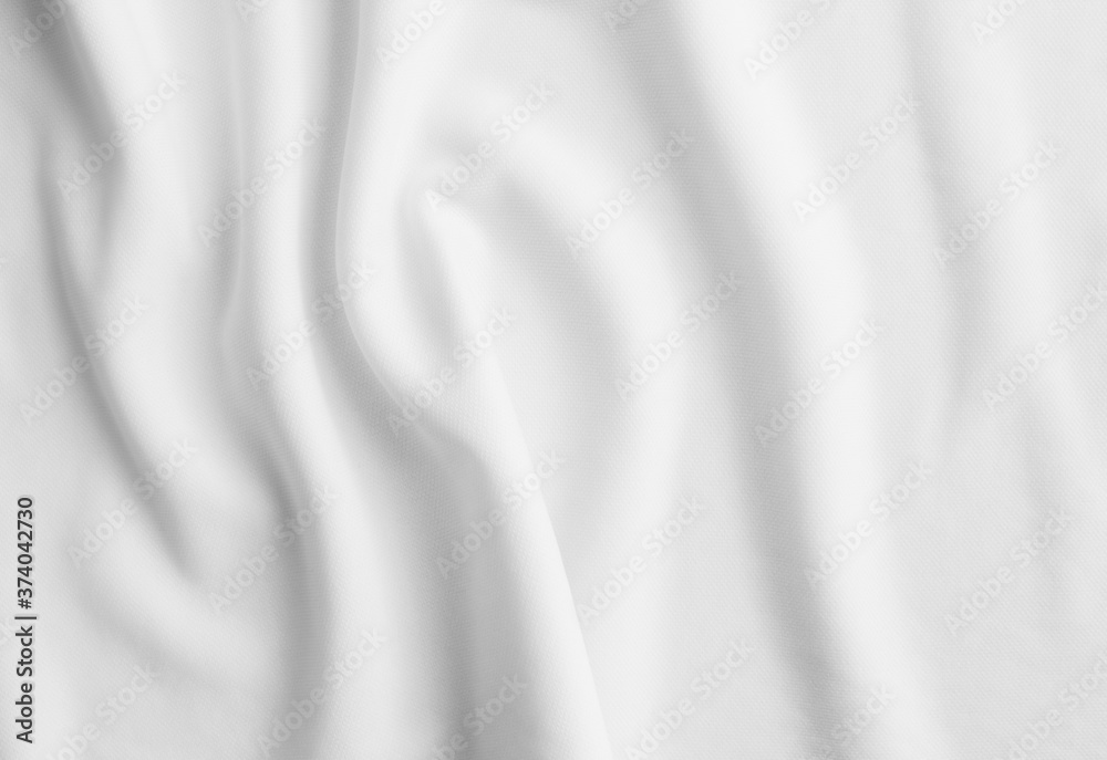 White abstract wavy clothes background. fabric texture