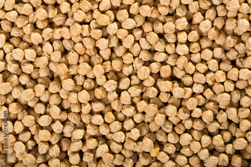 Natural background of raw chickpea. Concept of healthy and nutritious food..