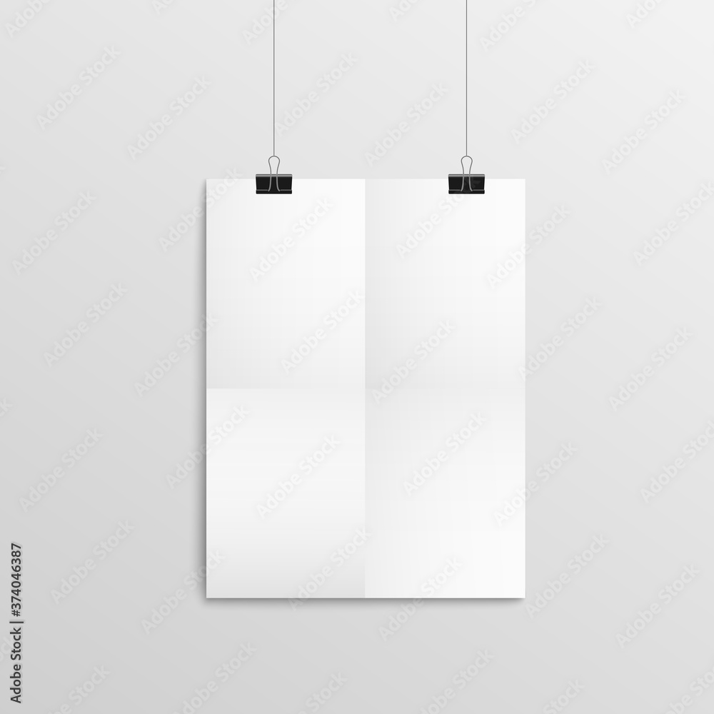 Blank piece of paper hanging on wall with black binder clips, empty mockup Blank piece of paper hanging on wall with black binder clips, empty mockup
