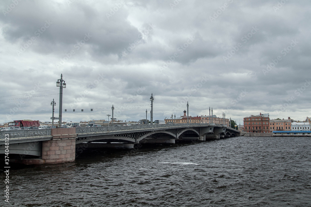 Saint Petersburg cloudy cityscape. Annunciation Bridge.