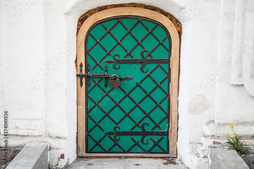 Medival old vintage green wooden door photo