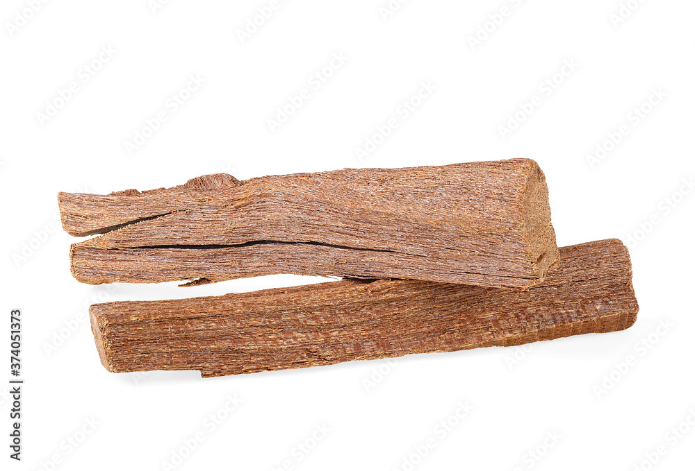 Fototapeta premium Sandalwood sticks isolated on a white background. Chandan or sandalwood.