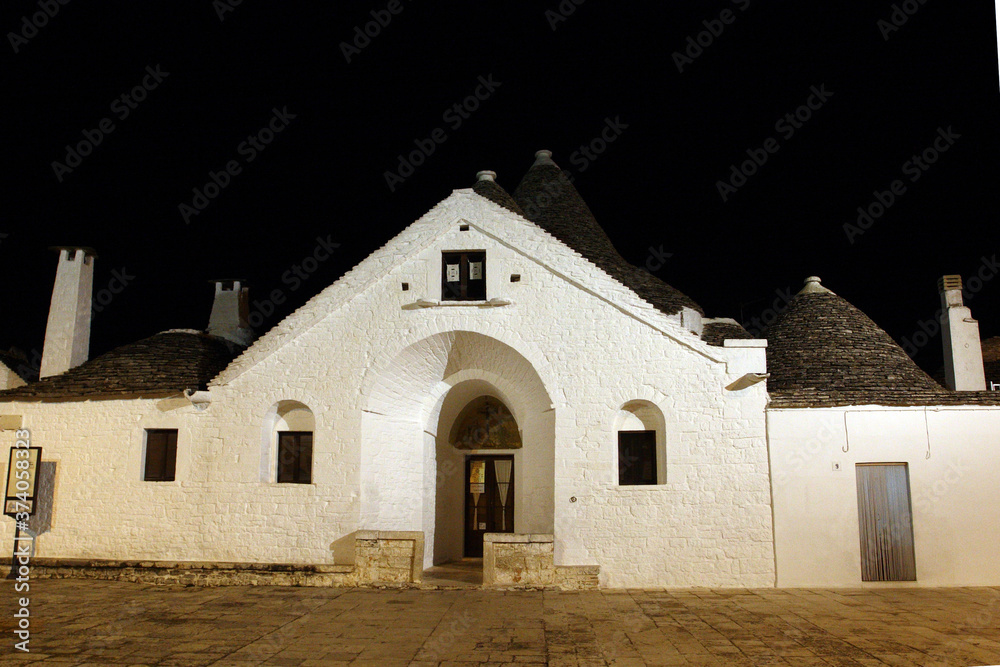 Alberobello, Italy - October 6, 2010: the characteristic houses called trulli