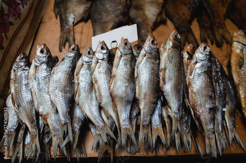 Several dried fish stew are lying on counter photo