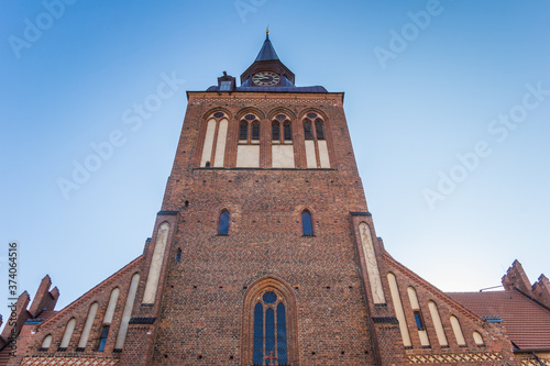 Tower of the historic dom church in Gustrow, Germany photo