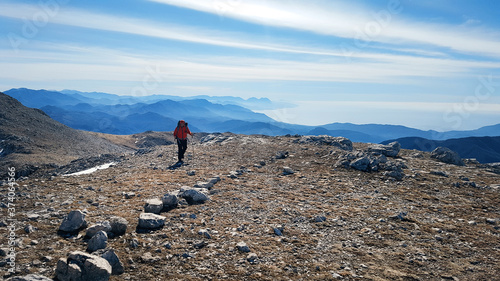 Bild auf Leinwand Men hiking on the top of Cervati mountain in Cilento National Park