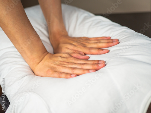 Hands Massage on Shoulder Blade close up