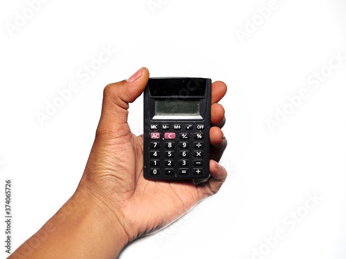 Hand holding calculator isolated on white background