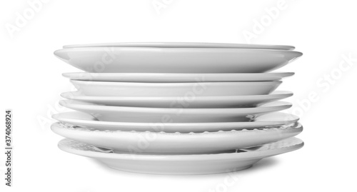 Stack of clean plates isolated on white