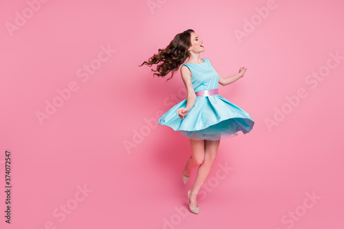 Full length body size view of her she nice-looking attractive lovely luxury charming cheerful cheery dreamy wavy-haired girl having fun dancing isolated over pink pastel color background