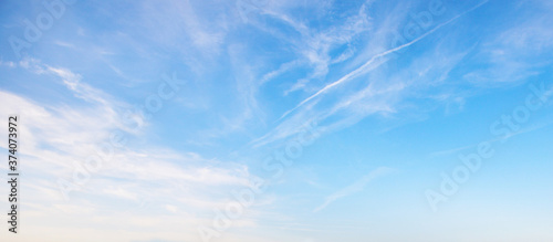 View of the blue sky with white clouds. Heavenly beauty. For wallpapers, backdrops and covers. 