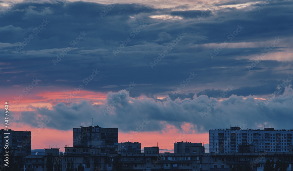 Sunset and storm clouds over the city. Kyiv, Ukraine.