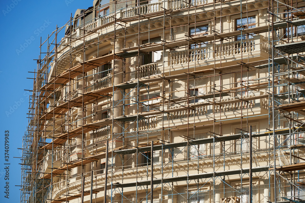 scaffolding and new building as background